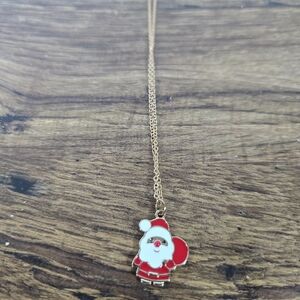 gold-tone chain necklace with an enamel Santa Claus pendant
